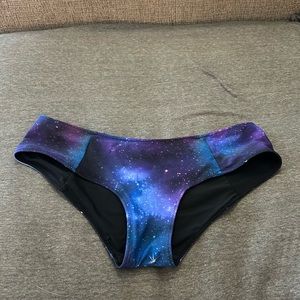 Galaxy print reversible swim bottoms